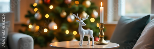 warm evening lit photograph tastefully styled side table centered around delicate reindeer figurine next