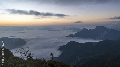 Epic Sunrise View from Phu Chi Fa Cliff over Sea of Mist, Northern Thailand Scenic Landscape