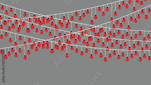 Festive red string lights decoration on a gray background