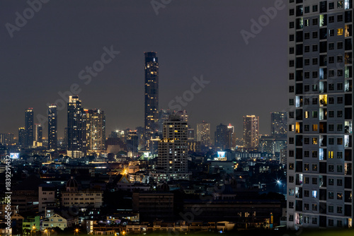 Wallpaper Mural The high angle background of the city view with the secret light of the evening, blurring of night lights, showing the distribution of condominiums, dense homes in the capital community Torontodigital.ca