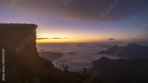 Epic Sunrise View from Phu Chi Fa Cliff over Sea of Mist, Northern Thailand Scenic Landscape