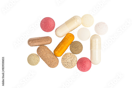 Various pills on white background