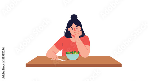Sad and unhappy young woman with an eating disorder has no appetite for the bowl of salad in front of her. The design shows emotion.