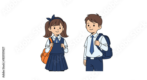 Smiling elementary school boy and girl in matching dark blue uniforms with backpacks stand together ready for their classes.