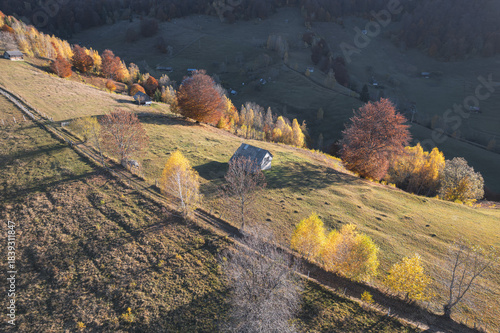 Sunny Autumn Aerial View of a Traditional Romanian Village in Transylvania