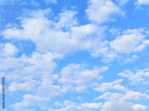 White clouds on the blue sky Minimalist style photography Simple but beautiful and natural There is space for text.