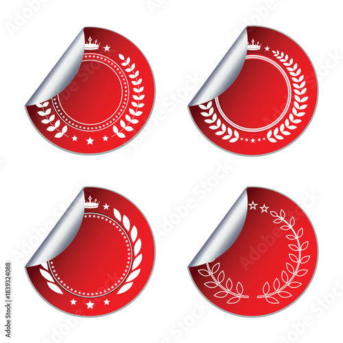 Illustration of a set of red labels with laurel wreaths and ribbons on a white background
