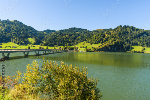 Bridge crosses Lake Sihlsee in the Swiss Alps near Einsiedeln, Canton of Schwyz, Switzerland