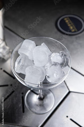 A delicious alcoholic cocktail at the bar. The bartender prepares cocktails