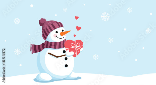 Festive cartoon snowman wearing a warm winter hat and scarf holds a red heart-shaped gift box while it snows on a light blue background.