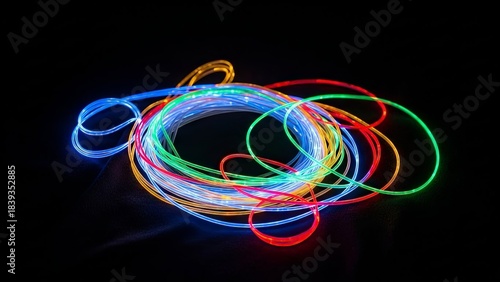Colorful glowing neon light wires in a tangle