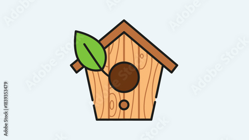 A simple wooden birdhouse with a brown roof and a green leaf on a light background.