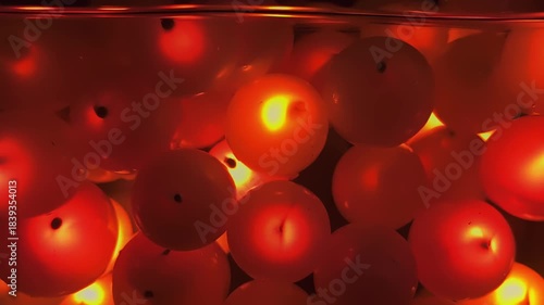 Colorful balls float in water with warm light effects during an indoor activity setting Generative AI