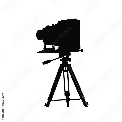 Vintage large format camera on tripod silhouette