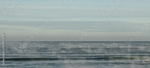 Global warming or warm ocean creating haze.