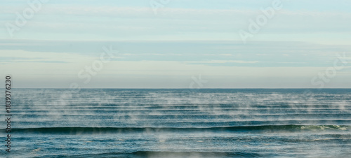 Global warming or warm ocean creating haze.