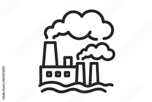 Factory with smoke rising into the sky during the day near a body of water