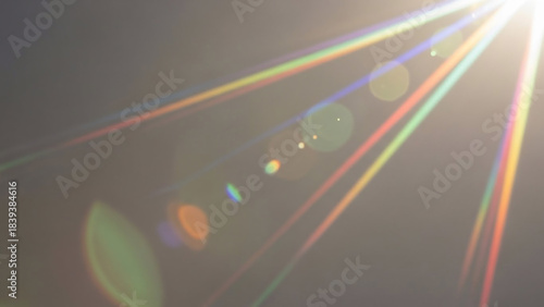 Vibrant light trails and colorful lens flares create an ethereal atmosphere for graphic design