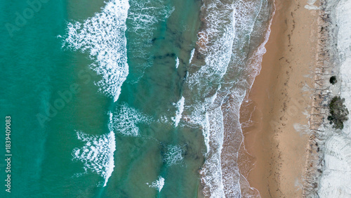 Fototapeta Naklejka Na Ścianę i Meble -  scala dei turchi Beautiful white beach from above drone shot pretty blue ocean sea 