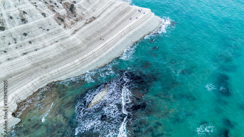 Fototapeta Naklejka Na Ścianę i Meble -  scala dei turchi Beautiful white beach from above drone shot pretty blue ocean sea 