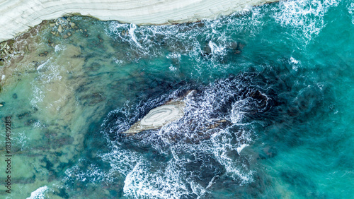 Fototapeta Naklejka Na Ścianę i Meble -  scala dei turchi Beautiful white beach from above drone shot pretty blue ocean sea 