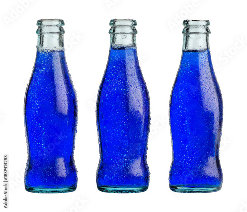 Refreshing Elixir: A trio of vintage glass bottles, each filled with a vibrant, effervescent, blue liquid. Evoking refreshment and a touch of nostalgia.