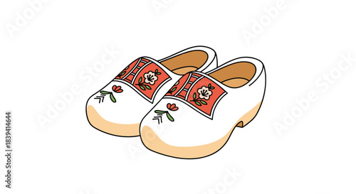 Pair of traditional white wooden clogs with a classic red floral pattern representing Dutch culture and national footwear.