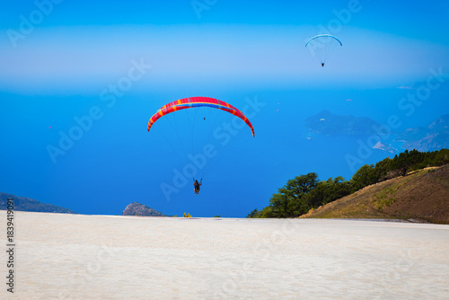 Fototapeta Naklejka Na Ścianę i Meble -  Flying paraglider at Babadag mountain in Turkey