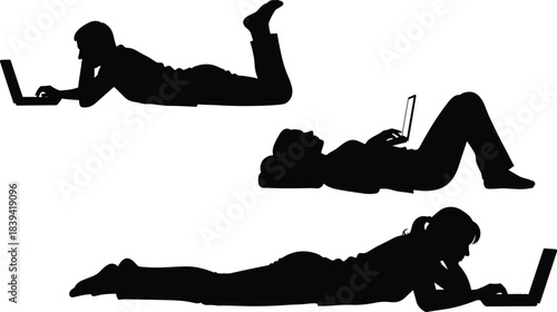People silhouette using laptop while lying relaxed showing modern digital lifestyle remote work online learning comfort flexibility and home technology