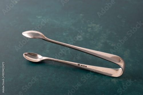 Antique collectible solid silver sugar tongs hallamarked in the United Kingdom Europe