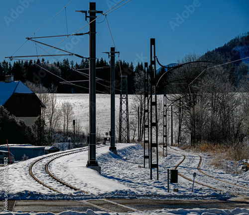 Tracks of the narrow-gauge railway line from Sankt Pölten to Mariazell and the standard-gauge museum tramway to Lake Erlauf in winter, Austria