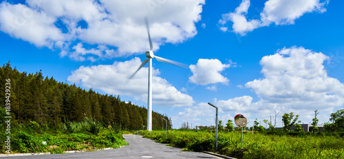 Wind power generation under blue sky and white clouds