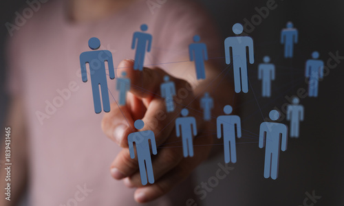 Hand pointing at network of...