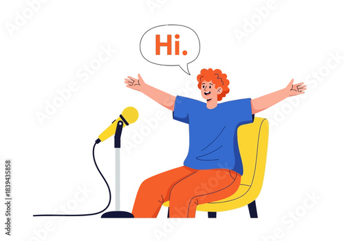 Man sitting in yellow chair speaking into a microphone with arms wide open, saying hi, white