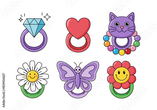 Set of cute baby rattles and toys with various shapes like diamond ring, heart, cat, flower, and butterfly, white