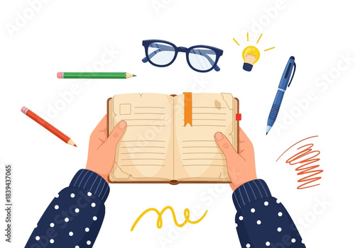 Hands holding open diary or journal surrounded by writing tools like pencils, pen, and glasses, with a lightbulb symbolizing an idea