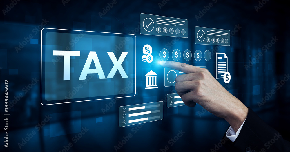 Obraz premium A businessman interacts with a digital interface displaying tax information and financial metrics, symbolizing modern tax calculation and management solutions. Gantry