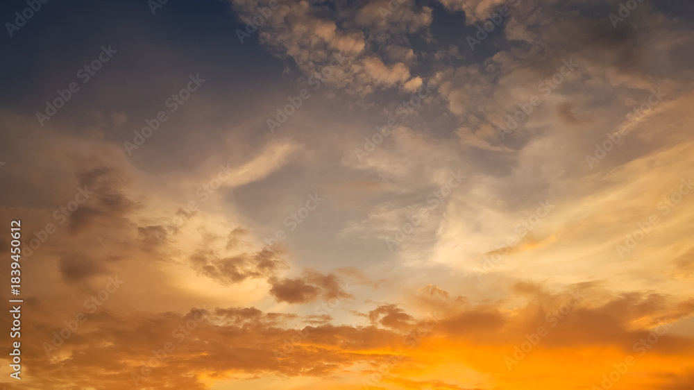 Naklejka premium Dramatic Sky with Golden Clouds