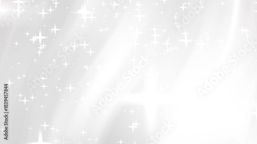 Overlap white sparkles and light rays create a background of overlapping white stars.