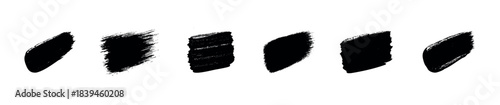 Collection of diverse black brush stroke shapes with textured edges, perfect for graphic design and abstract visual applications.