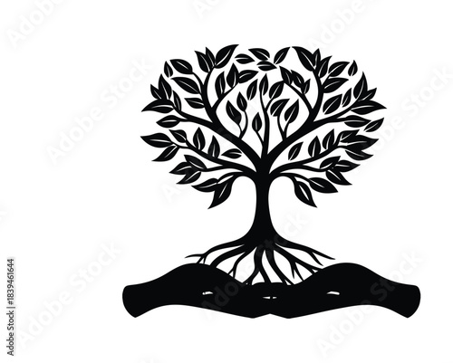 Black silhouette of a tree with roots held by hands on white background holding