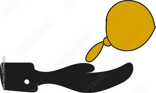 Hand holding a golden balloon