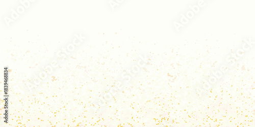 Soft golden texture with a speckled gradient resembling light dust particles