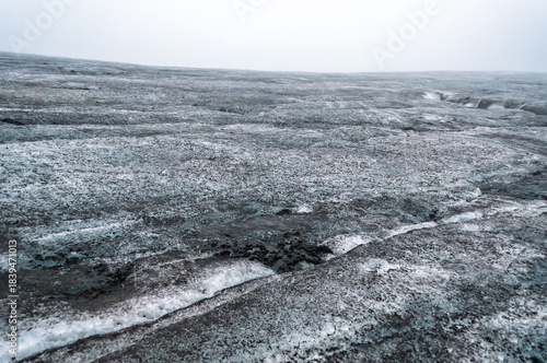 Glacier texture in shades of blue, turquoise, gray, and white. Design and wallpapers.