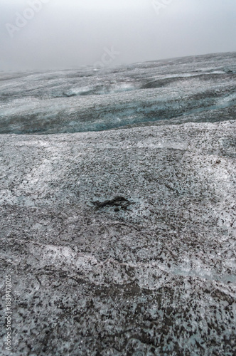 Glacier texture in shades of blue, turquoise, gray, and white. Design and wallpapers.