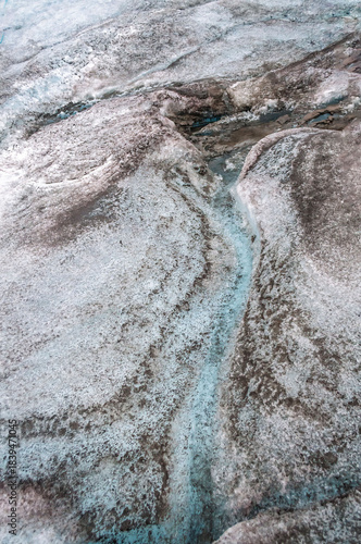 Glacier texture in shades of blue, turquoise, gray, and white. Design and wallpapers.