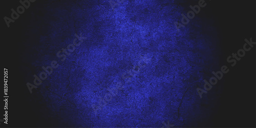 Dark blue abstract background with purple nebula, starry light, and cloud texture design. Blue abstract grunge wall texture pattern design for dark vintage paper backdrop