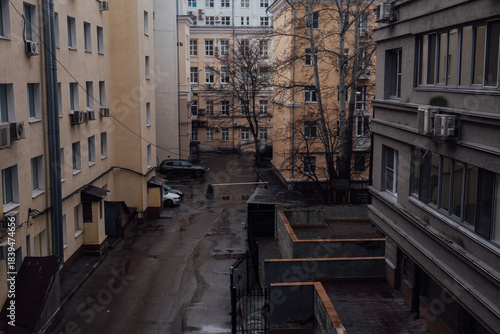 A city street on a cold cloudy rainy day