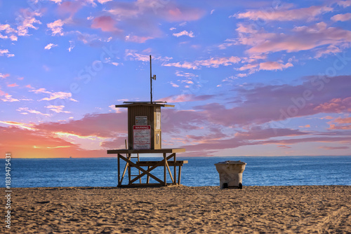 A lifeguard tower in a gorgeous landscape at Newport Beach at sunset in Newport Beach California USA