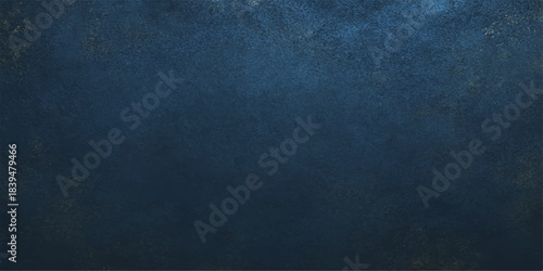 A dark blue grunge background features a textured vintage paper pattern with a rough dirty surface and black weathered canvas material for a blank old backdrop